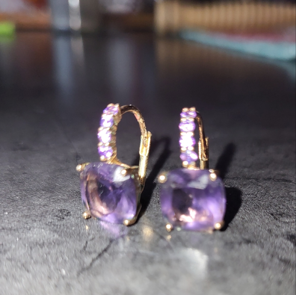 Purple swarovski crystal gold tone earrings.